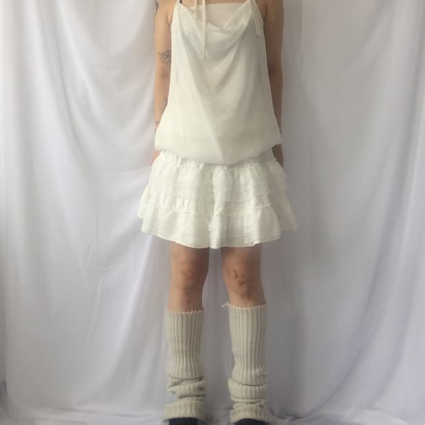 Tied drape point sleeveless