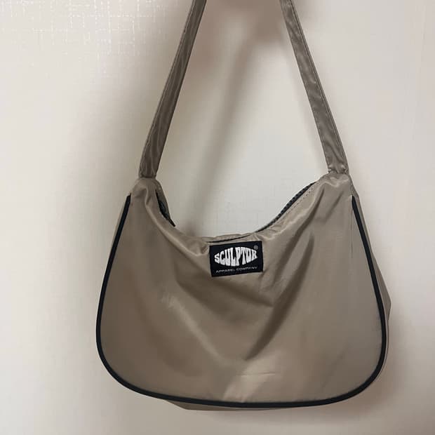 스컬프터 베이지 가방