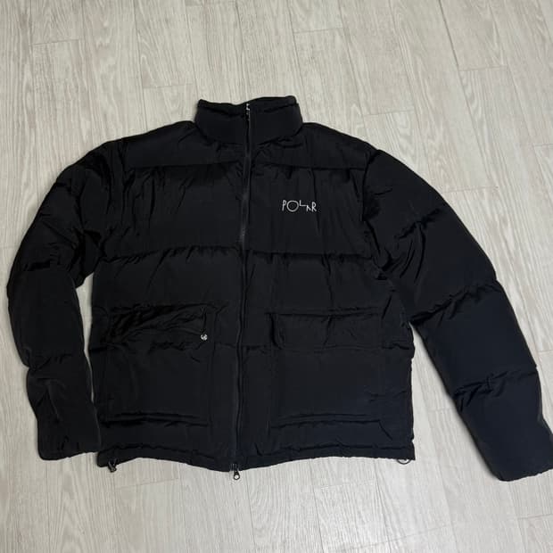 [L] 폴라스케이트 포켓 푸퍼 구스다운 블랙