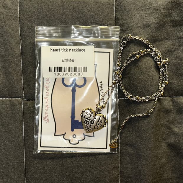 Nff heart tick necklace