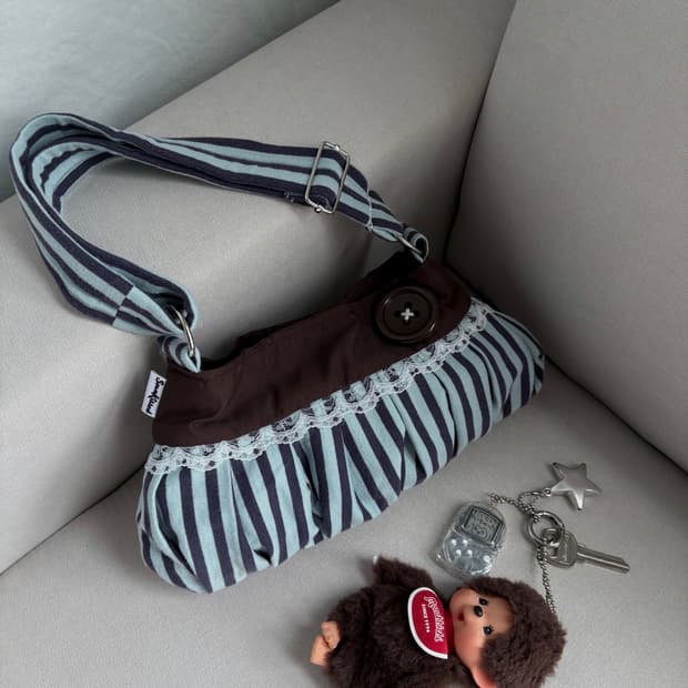 Coraline button shoulder bag