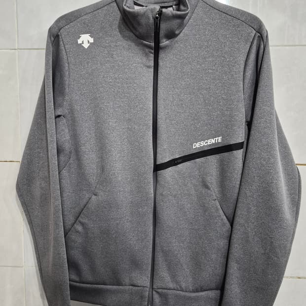 데상트 여성 자켓