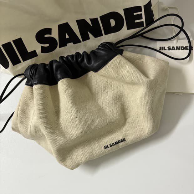 질샌더 드로우 스트링 캔버스 크로스바디 백