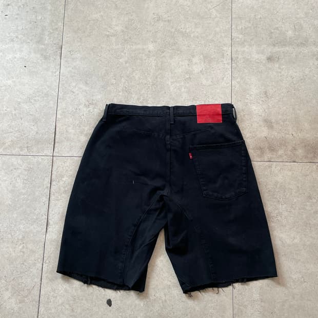 리바이스 프리미엄 LEJ570 블랙 데님 반바지 컷오프(Blank Tap