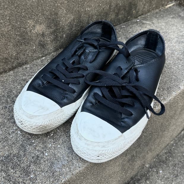 Converse all star black leather shoes