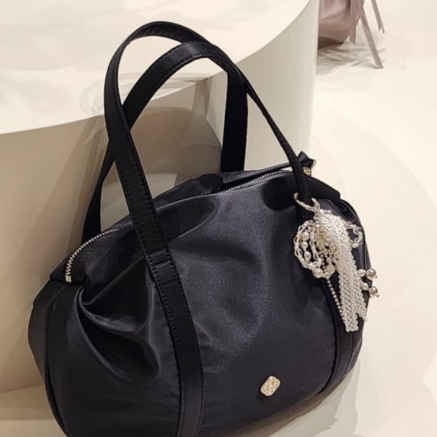 히어리 오로라 셔링 더플백