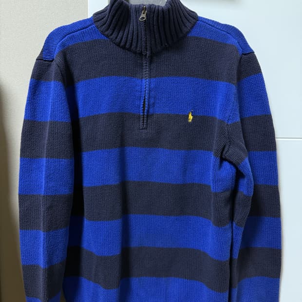 폴로 반집업 니트