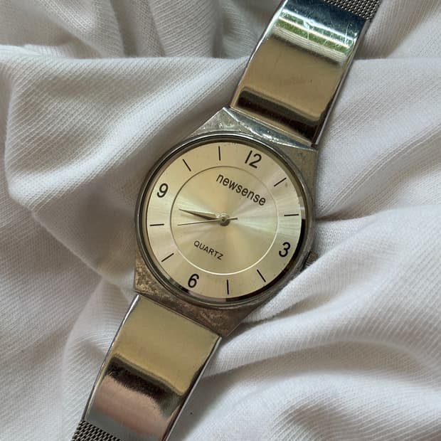 vintage newsense metal clear watch