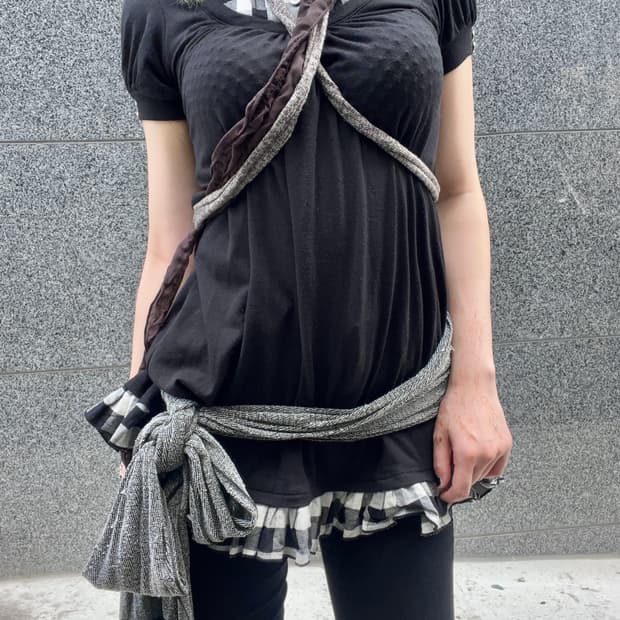 brown scarf looks like rope