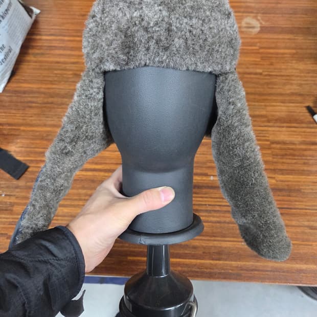 몽벨 구스다운 트루퍼 귀달이 플리스 패딩모자 m