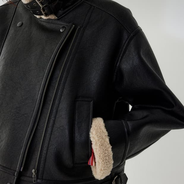 스튜디오 톰보이 배색라인신세틱 무스탕