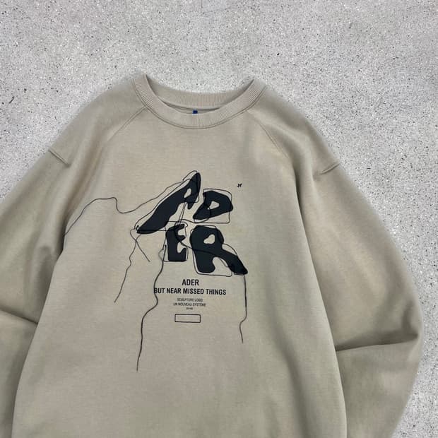 아더에러 스컬프터 로고 맨투맨