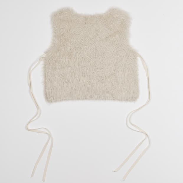 낫띵에브리띵 OPEN SIDE VEGAN FUR VEST IN IVOR