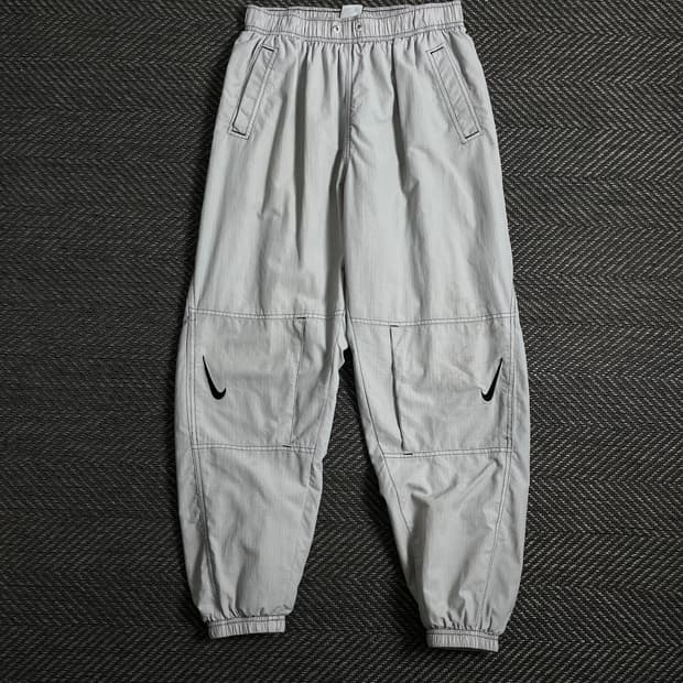 나이키 리펠 스우시 자수 나일론 트랙 조거 팬츠o 4508