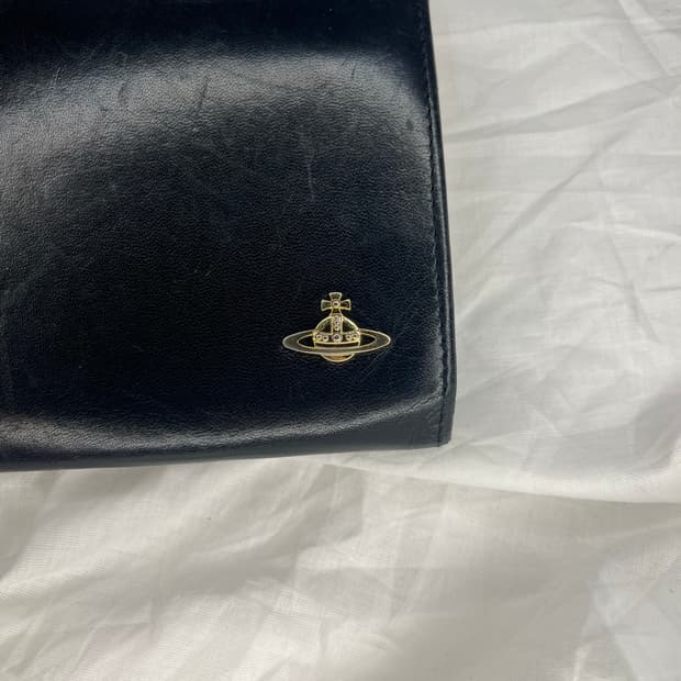 비비안웨스트우드 오브 프레임 키스락 장지갑