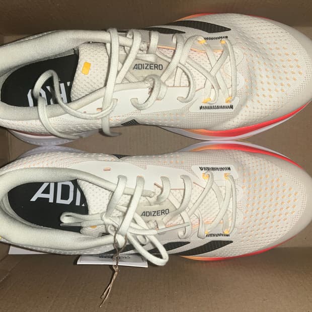 아디제로 SL 아이보리 코어블랙 265