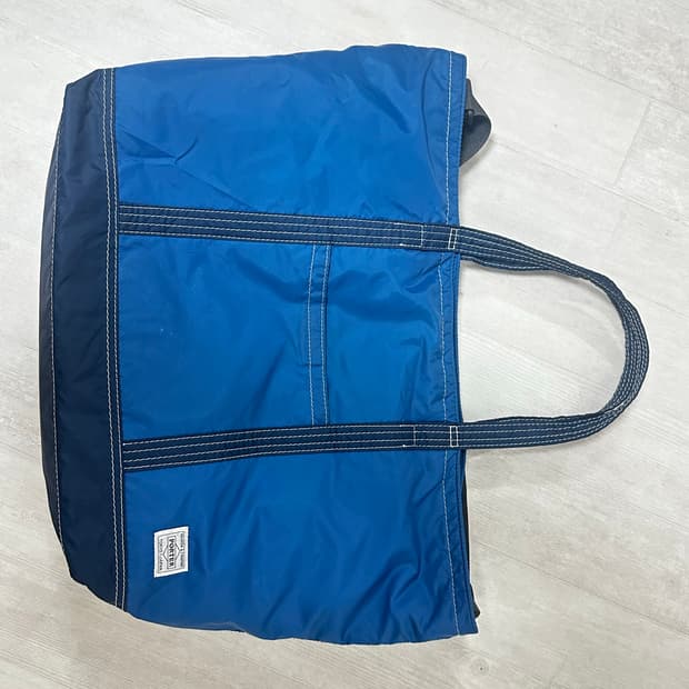 포터 파란색 가방