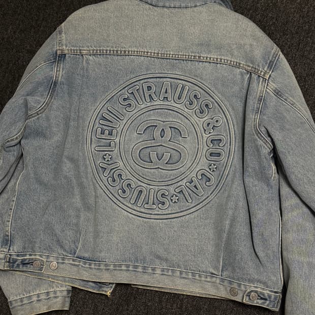 [L] 스투시 x 리바이스 엠보스드 트러커 자켓 인디고