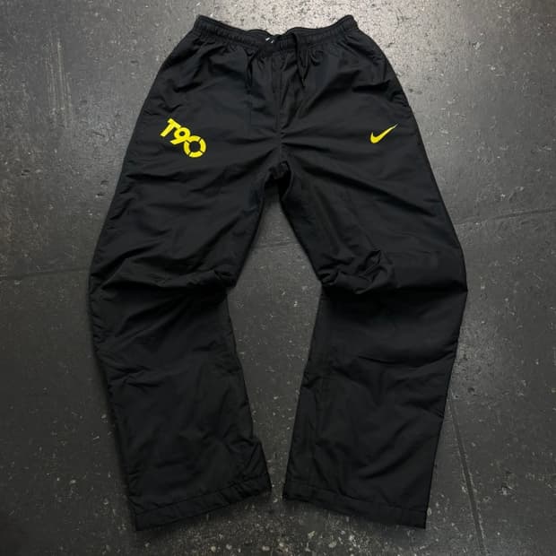 100 나이키 스톰핏 토탈90 나일론 팬츠