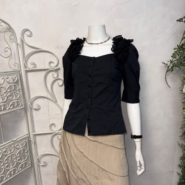 Black pin tucked dot ruffle button bl