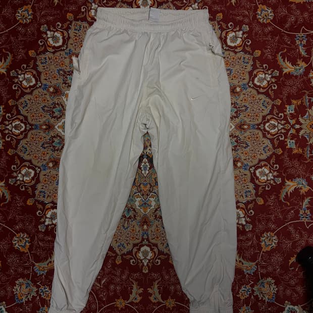 나이키 nrg 솔로 스우시 트랙팬츠 팬텀화이트 국내 백화점판