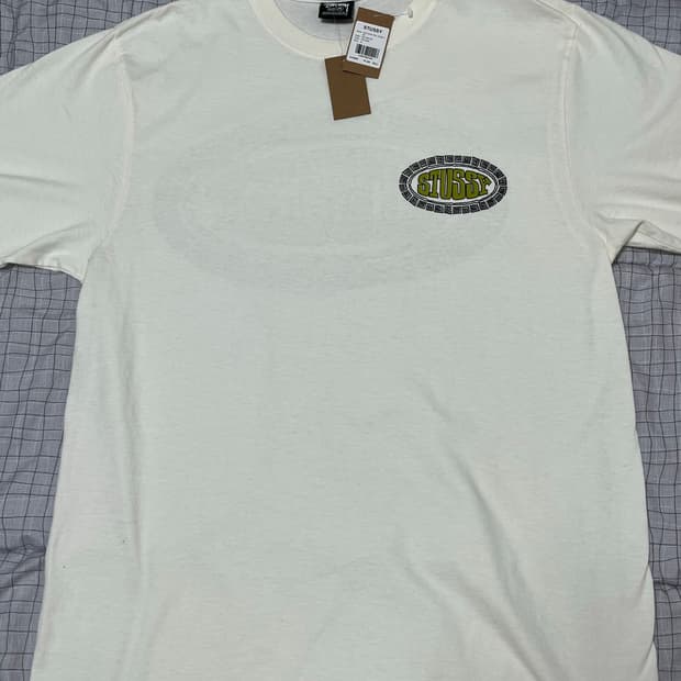 스투시 타일 오벌 피그먼트 다이드 티셔츠 아이보리