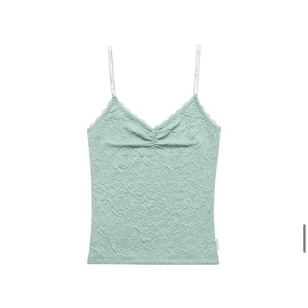 미레코 FLOWER EMBOSSED SLEEVELESS