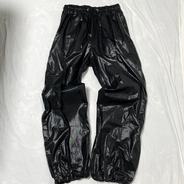 Eseelmi Glossy Nylon Zip Track Pants
