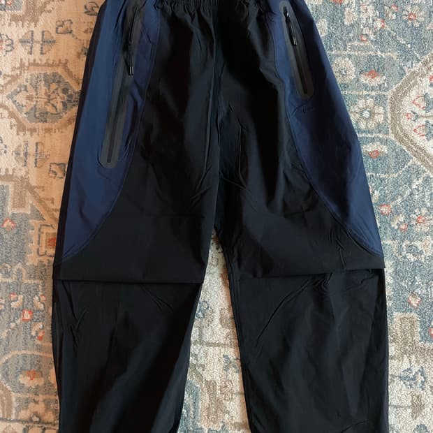 나이키 테크 드라이핏 우븐 컬러 블록 오버사이즈 블랙 팬츠 (새제품. L