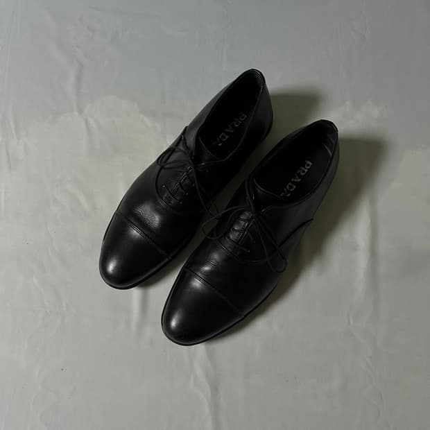 Prada sports cap toe derby shoes