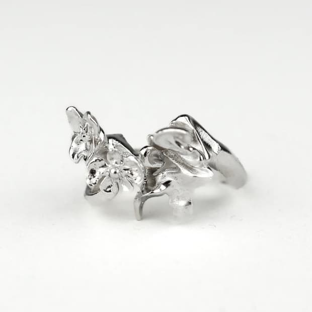 ASTERISK Double Headed Floral Ring