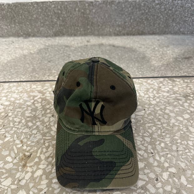 New era x this is never that camo cap