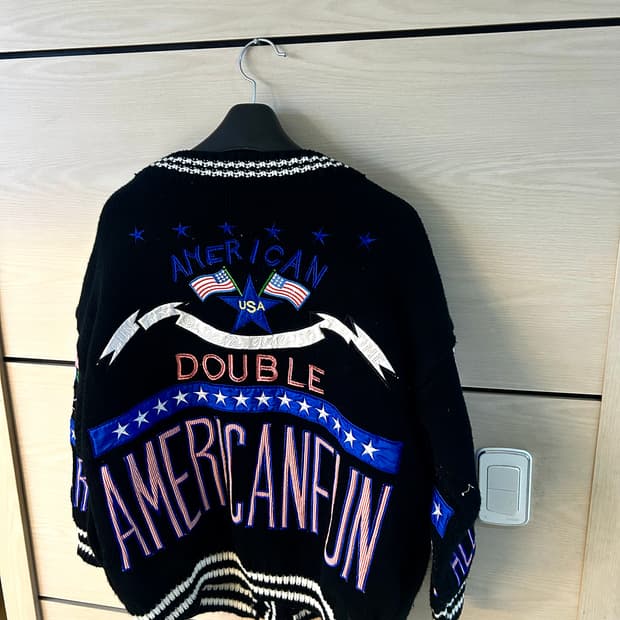 Stitch Logo Over Black Cardigan