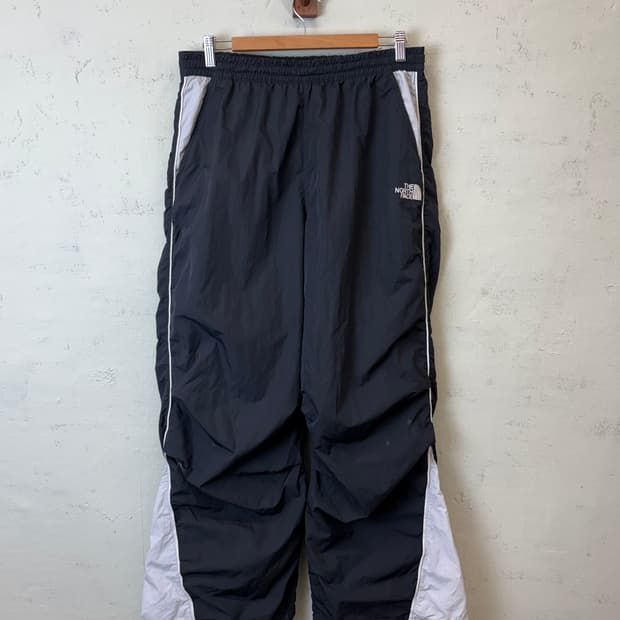 노스페이스 나일론 스트링 부츠컷 트랙팬츠