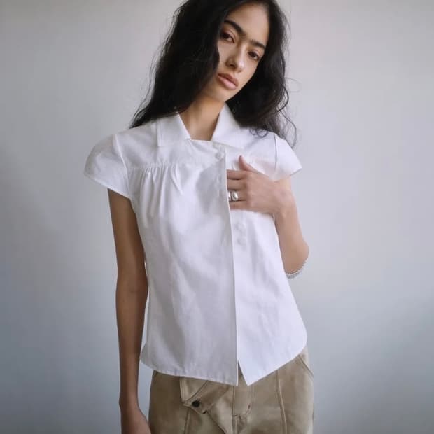 [porterna] wrap button cap sleeve blouse