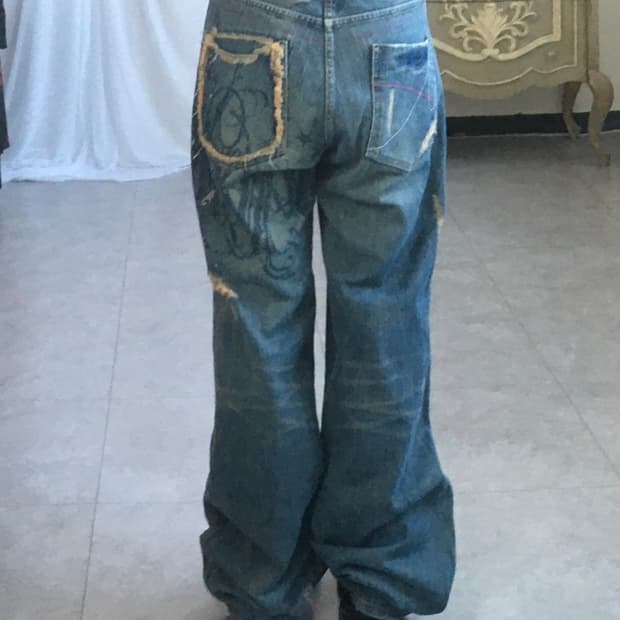 Back point denim pants