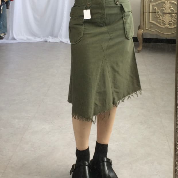 Out pocket point fringe midi skirt