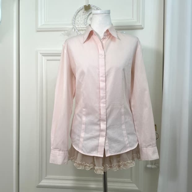 pink ruffle sleeveless blouse