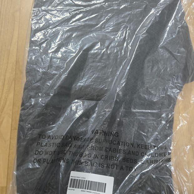 슈프림 스네이크 프린트 치노 팬츠