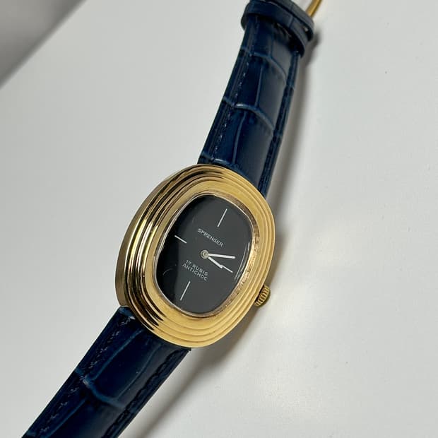 스프렝거 오벌 골드 드레스 워치