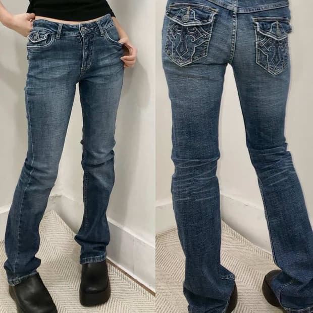 오피우라 cross detail slim fit denim pants
