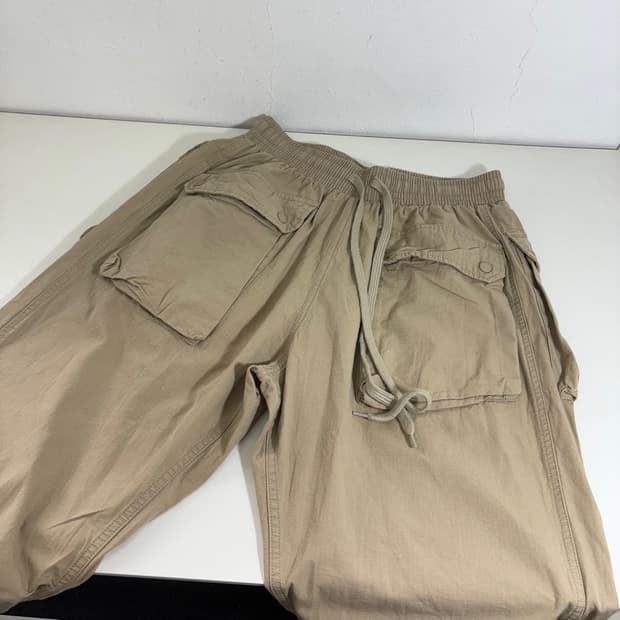 XL 엑스트라오디너리 베이지 밑단스트링 유틸리티팬츠