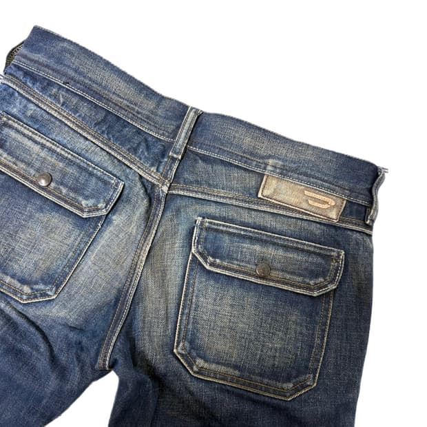 디젤 백로고 플레어핏 데님팬츠