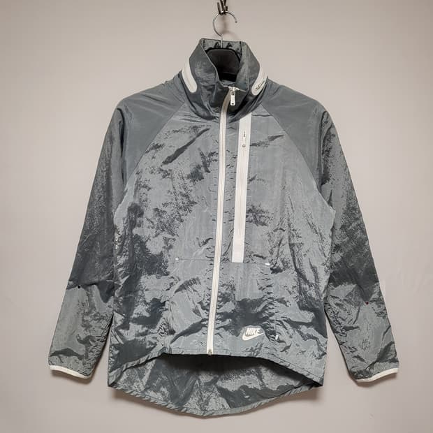 나이키 테크모토 여성 케이프 바람막이