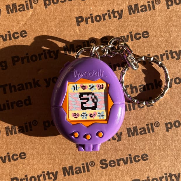 90s vtg Tamagotchi Purple Case Keyring