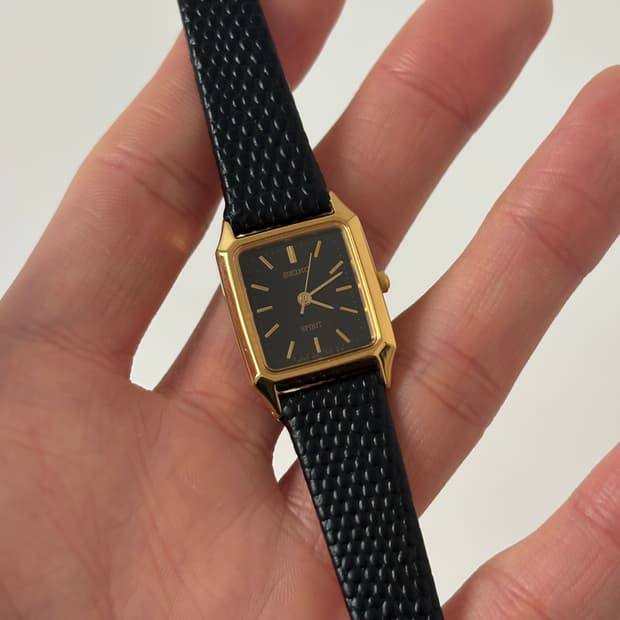 1990s Spirit Black Dial Gold Tank Quartz