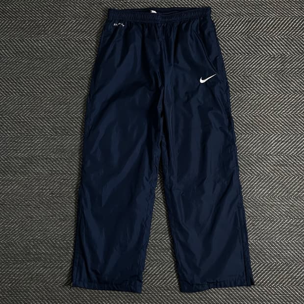 나이키 스톰핏 와이드핏 우븐 트랙팬츠o 3422