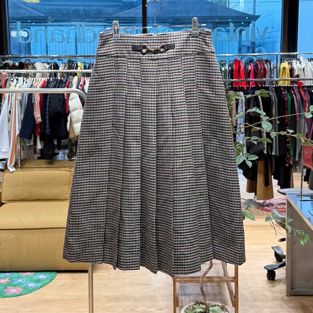 아쿠아스큐텀 브라운 하운드투스 핀턱 미디스커트 