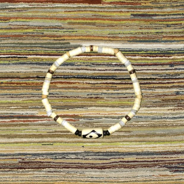 cream cortis logo mood bracelet