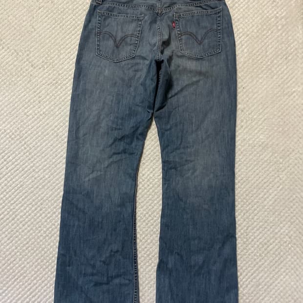 리바이스 527 플레어 핏 부츠컷 데님 팬츠